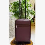 WINE TEXTURED SUITCASE