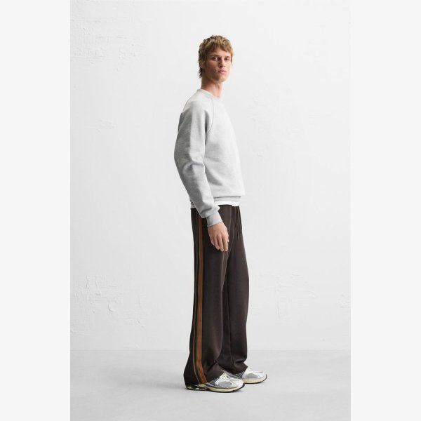 TECHNICAL PANTS WITH BANDS - Image 1