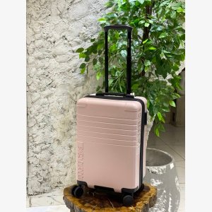 EXPANDABLE SPINNER SUITCASE