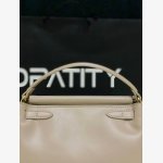 JW PEI Carmen Top Handle Bag in the color Apricot. - Image 2