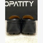 Prada black Pebbled Leather Loafers featuring a brand signature logo on gunmetal-tone hardware. - Image 2