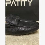 Prada black Pebbled Leather Loafers featuring a brand signature logo on gunmetal-tone hardware. - Image 5