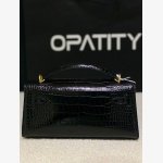 black crocodile-embossed handbag from the brand JW PEI It features a classic structured silhouette with a croc-embossed texture and sleek gold-tone hardware. - Image 7