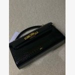 black crocodile-embossed handbag from the brand JW PEI It features a classic structured silhouette with a croc-embossed texture and sleek gold-tone hardware. - Image 6