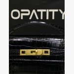 black crocodile-embossed handbag from the brand JW PEI It features a classic structured silhouette with a croc-embossed texture and sleek gold-tone hardware. - Image 4